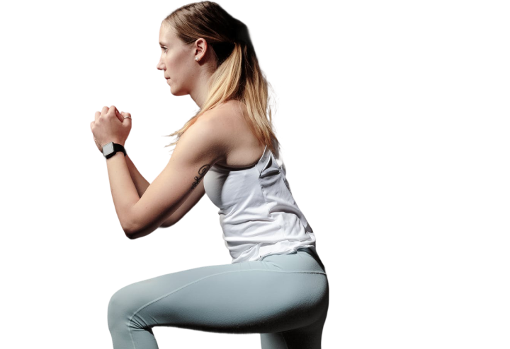 trenerka personalna robiąca przysiad 